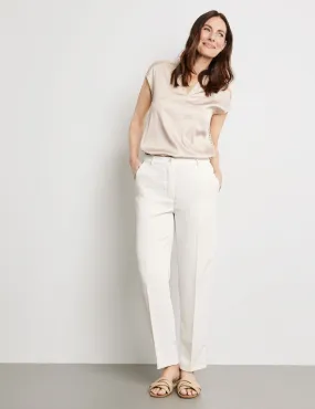 Elegant trousers with pressed pleats