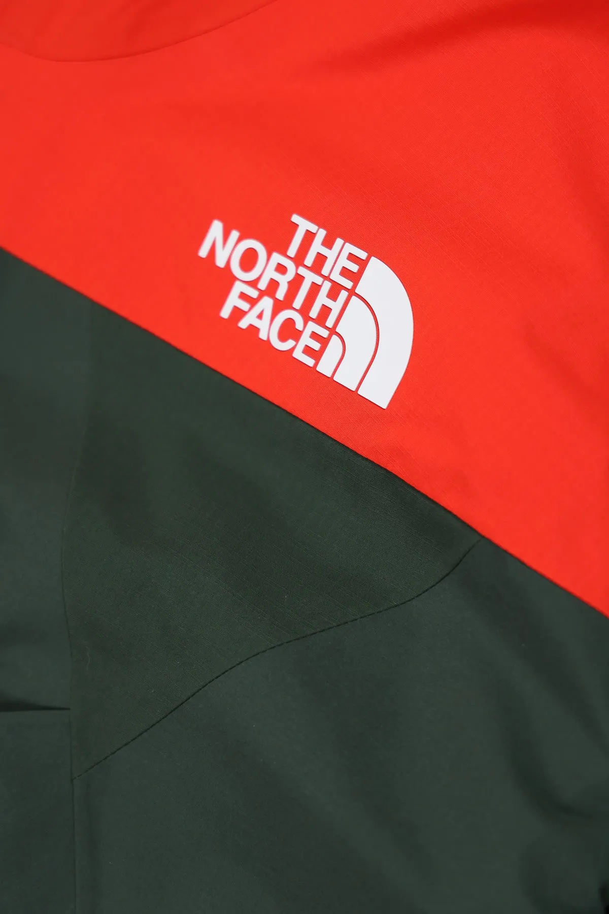 TNF x Undercover Soukuu Geodesic Shell Jacket - Dark Cedar Green/High Risk Red